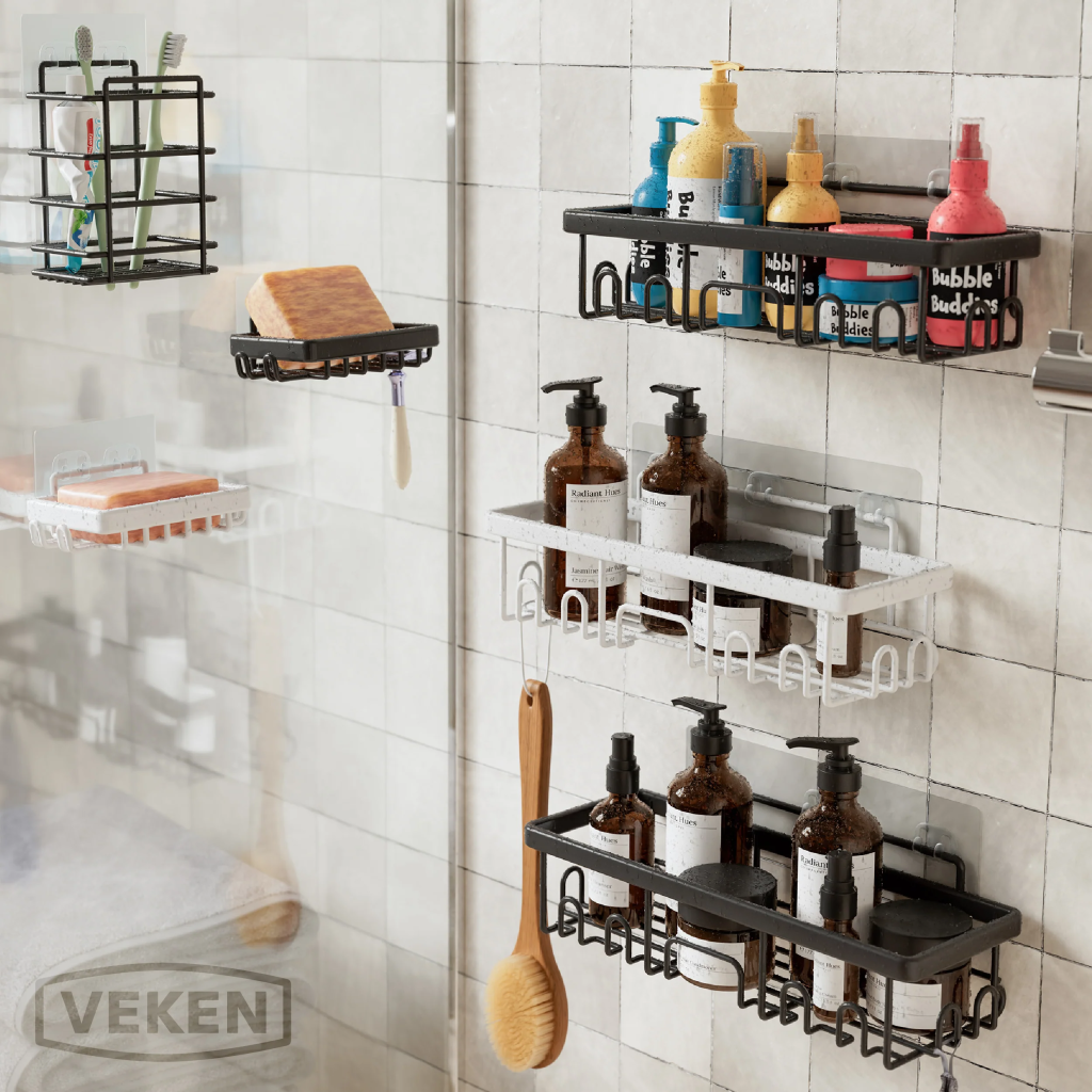 black and white shower caddies on tile wall